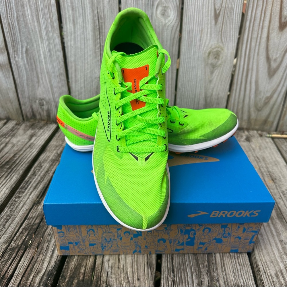 Brooks Draft XC racing spikes, men’s size 11.5, green gecko, red orange, white.